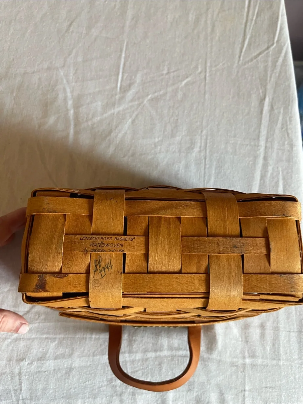 Longaberger woven basket in warm tan